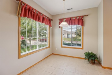 Enjoy low-maintenance living in this zero-entry, move-in ready on Briarwood Club of Ankeny in Iowa - for sale on GolfHomes.com, golf home, golf lot