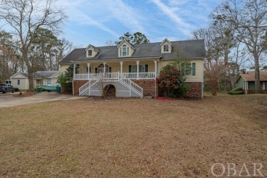 Welcome to your dream home, perfectly positioned in the heart of on Duck Woods Country Club in North Carolina - for sale on GolfHomes.com, golf home, golf lot