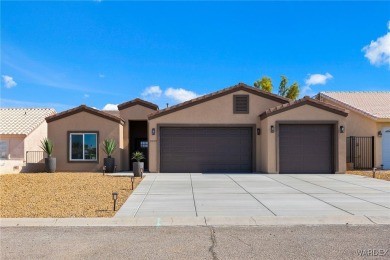 Welcome to your dream home in the highly sought-after Desert on Desert Lakes Golf Course in Arizona - for sale on GolfHomes.com, golf home, golf lot