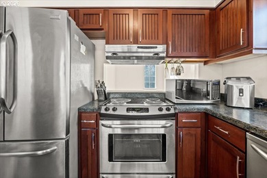 Lovely and spacious upper-level condo in the sought-after on Charbonneau Golf Club in Oregon - for sale on GolfHomes.com, golf home, golf lot