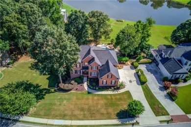 Welcome to this stunning 6 bedroom, 4 bath lakefront home in on Hamilton Mill Golf Club in Georgia - for sale on GolfHomes.com, golf home, golf lot