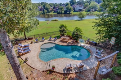 Welcome to this stunning 6 bedroom, 4 bath lakefront home in on Hamilton Mill Golf Club in Georgia - for sale on GolfHomes.com, golf home, golf lot