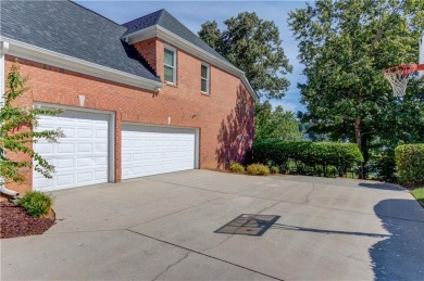 Welcome to this stunning 6 bedroom, 4 bath lakefront home in on Hamilton Mill Golf Club in Georgia - for sale on GolfHomes.com, golf home, golf lot