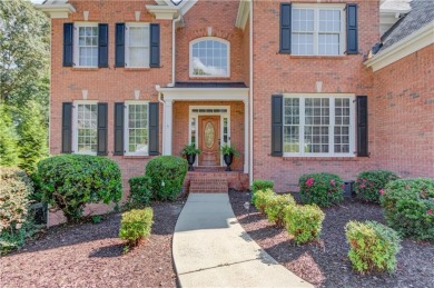 Welcome to this stunning 6 bedroom, 4 bath lakefront home in on Hamilton Mill Golf Club in Georgia - for sale on GolfHomes.com, golf home, golf lot