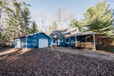 Discover the perfect retreat in this cozy chalet, ideally on Burning Oak Country Club in Michigan - for sale on GolfHomes.com, golf home, golf lot