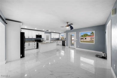 Completely remodeled and move-in ready, this beautiful river on Riverbend Golf and Country Club in Florida - for sale on GolfHomes.com, golf home, golf lot