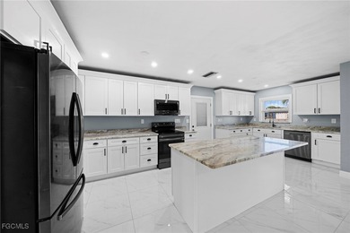 Completely remodeled and move-in ready, this beautiful river on Riverbend Golf and Country Club in Florida - for sale on GolfHomes.com, golf home, golf lot