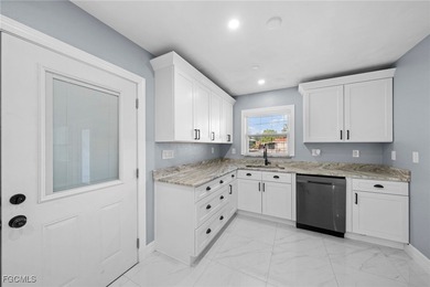 Completely remodeled and move-in ready, this beautiful river on Riverbend Golf and Country Club in Florida - for sale on GolfHomes.com, golf home, golf lot