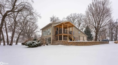 CAPTIVATING RESIDENCE ON 3 SPACIOUS LOTS--A NATURE LOVER'S on Rice Lake Golf and Country Club in Iowa - for sale on GolfHomes.com, golf home, golf lot