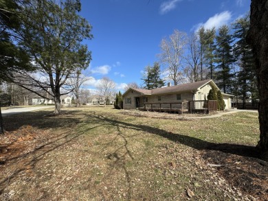 A MUST-SEE all stone ranch located in established Carmel on Woodland Country Club in Indiana - for sale on GolfHomes.com, golf home, golf lot