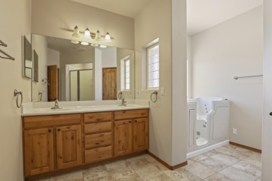 This beautiful custom-built home is ideally located on a quiet on  in Arizona - for sale on GolfHomes.com, golf home, golf lot