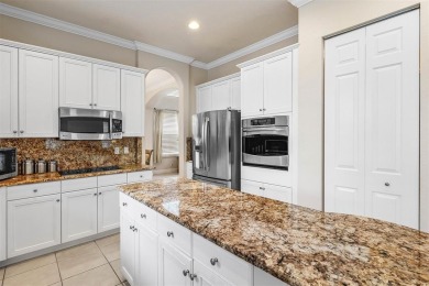 Magnificent opportunity to own this gem in prestigious Heron on Heron Bay Golf Club in Florida - for sale on GolfHomes.com, golf home, golf lot