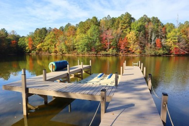 GENTLY SLOPED lakefront has a NEW DOCK! Build your dream lake on The Patriot Golf Club At Grand Harbor in South Carolina - for sale on GolfHomes.com, golf home, golf lot