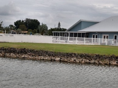 Discover a lovely home in Florida with breathtaking water views! on Golden Lakes Golf Course in Florida - for sale on GolfHomes.com, golf home, golf lot