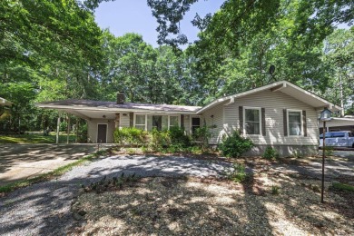 Don't miss this one!  Large living room with picture window and on Cortez Golf Course in Arkansas - for sale on GolfHomes.com, golf home, golf lot