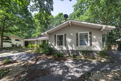 Don't miss this one!  Large living room with picture window and on Cortez Golf Course in Arkansas - for sale on GolfHomes.com, golf home, golf lot