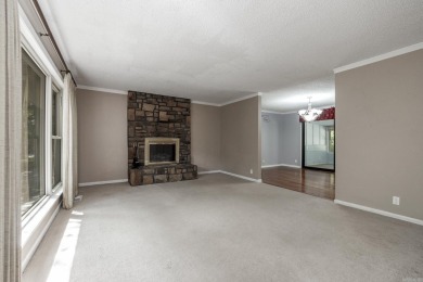 Don't miss this one!  Large living room with picture window and on Cortez Golf Course in Arkansas - for sale on GolfHomes.com, golf home, golf lot
