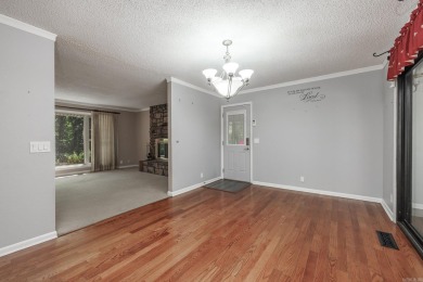 Don't miss this one!  Large living room with picture window and on Cortez Golf Course in Arkansas - for sale on GolfHomes.com, golf home, golf lot