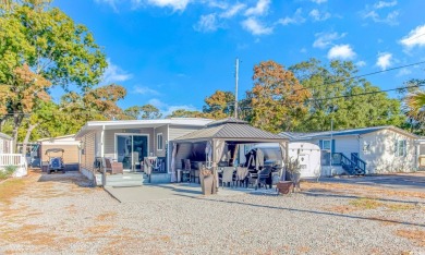 Reside at the Beach in the sought-after Apache Campground, which on Arcadian Shores Golf Club in South Carolina - for sale on GolfHomes.com, golf home, golf lot