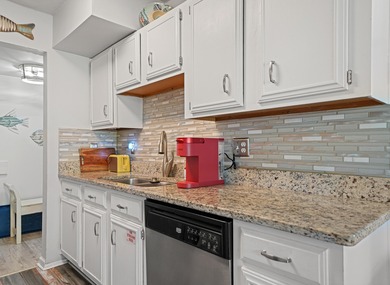 This beautifully renovated Villa is perfectly placed in Seascape on Seascape Golf Course in Florida - for sale on GolfHomes.com, golf home, golf lot