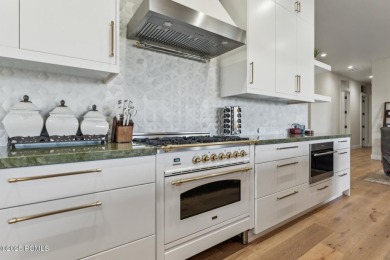 Nestled on a sprawling 5.86-acre lot surrounded by the serene on Victory Ranch Golf Club in Utah - for sale on GolfHomes.com, golf home, golf lot