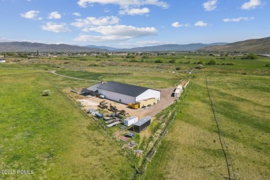 Nestled on a sprawling 5.86-acre lot surrounded by the serene on Victory Ranch Golf Club in Utah - for sale on GolfHomes.com, golf home, golf lot