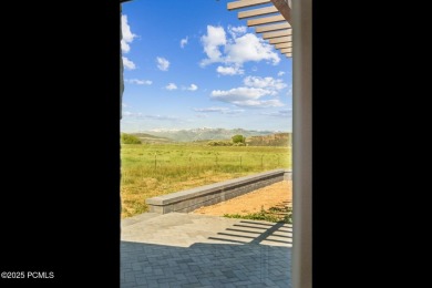 Nestled on a sprawling 5.86-acre lot surrounded by the serene on Victory Ranch Golf Club in Utah - for sale on GolfHomes.com, golf home, golf lot