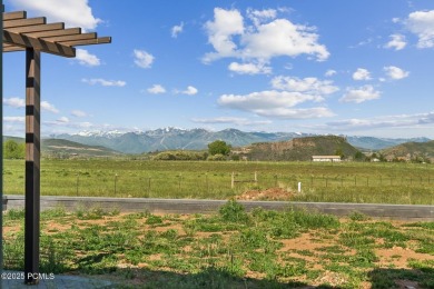 Nestled on a sprawling 5.86-acre lot surrounded by the serene on Victory Ranch Golf Club in Utah - for sale on GolfHomes.com, golf home, golf lot