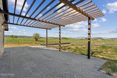 Nestled on a sprawling 5.86-acre lot surrounded by the serene on Victory Ranch Golf Club in Utah - for sale on GolfHomes.com, golf home, golf lot