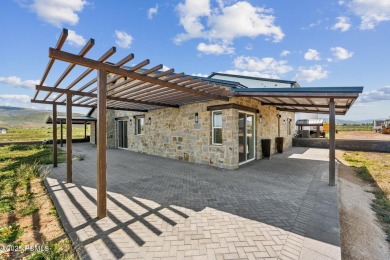 Nestled on a sprawling 5.86-acre lot surrounded by the serene on Victory Ranch Golf Club in Utah - for sale on GolfHomes.com, golf home, golf lot