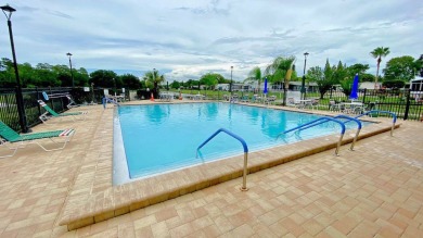 RETIRE IN STYLE WITHOUT BREAKING THE BANK! This gorgeous 2 on Fairways Country Club in Florida - for sale on GolfHomes.com, golf home, golf lot