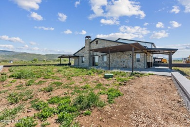 Nestled on a sprawling 5.86-acre lot surrounded by the serene on Victory Ranch Golf Club in Utah - for sale on GolfHomes.com, golf home, golf lot