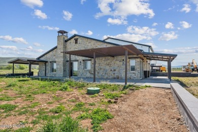 Nestled on a sprawling 5.86-acre lot surrounded by the serene on Victory Ranch Golf Club in Utah - for sale on GolfHomes.com, golf home, golf lot