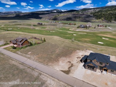 This beautiful site with East Facing back views could be perfect on Headwaters Club At Teton Springs in Idaho - for sale on GolfHomes.com, golf home, golf lot