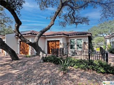 As you enter this gated community canopied in mature oak trees on Rockport Country Club in Texas - for sale on GolfHomes.com, golf home, golf lot