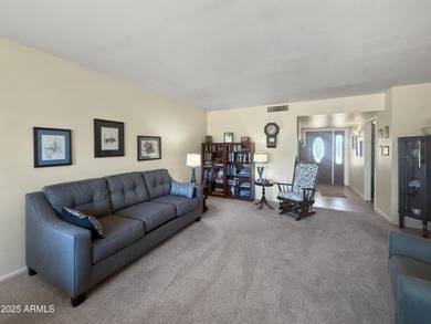 Welcome to this inviting Sun City home offering a comfortable on Sun City Lakes West and East in Arizona - for sale on GolfHomes.com, golf home, golf lot