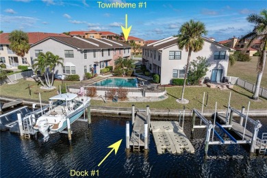 STUNNING WATERFRONT TOWNHOME IN PGI W/DEEDED DOCK - Discover the on Saint Andrews South Golf Club in Florida - for sale on GolfHomes.com, golf home, golf lot