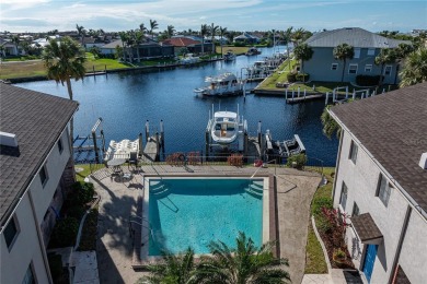 STUNNING WATERFRONT TOWNHOME IN PGI W/DEEDED DOCK - Discover the on Saint Andrews South Golf Club in Florida - for sale on GolfHomes.com, golf home, golf lot