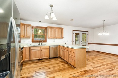 Welcome to this beautiful 3-bedroom, 2-bath home located in a on Carolina Trace Country Club in North Carolina - for sale on GolfHomes.com, golf home, golf lot