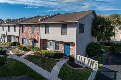 STUNNING WATERFRONT TOWNHOME IN PGI W/DEEDED DOCK - Discover the on Saint Andrews South Golf Club in Florida - for sale on GolfHomes.com, golf home, golf lot