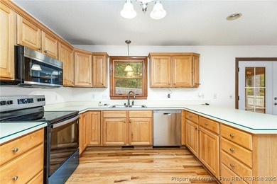 Welcome to this beautiful 3-bedroom, 2-bath home located in a on Carolina Trace Country Club in North Carolina - for sale on GolfHomes.com, golf home, golf lot