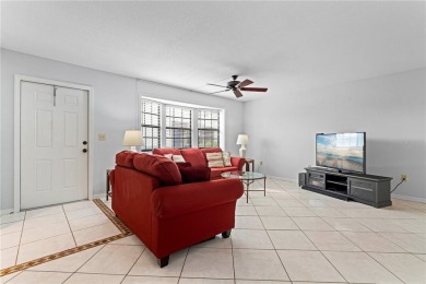 STUNNING WATERFRONT TOWNHOME IN PGI W/DEEDED DOCK - Discover the on Saint Andrews South Golf Club in Florida - for sale on GolfHomes.com, golf home, golf lot