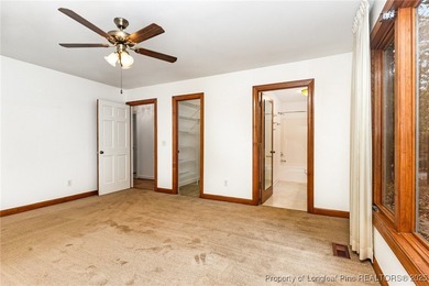 Welcome to this beautiful 3-bedroom, 2-bath home located in a on Carolina Trace Country Club in North Carolina - for sale on GolfHomes.com, golf home, golf lot