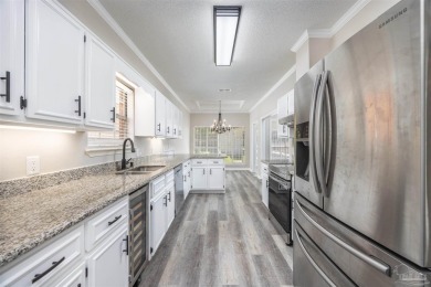 Welcome to this beautifully maintained 3-bedroom, 2-bath on Tiger Point Golf and Country Club in Florida - for sale on GolfHomes.com, golf home, golf lot