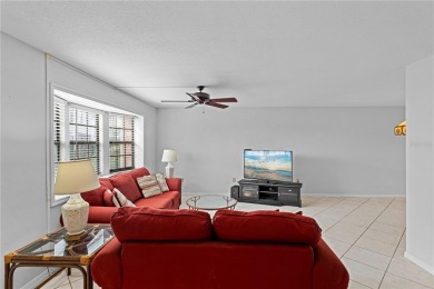 STUNNING WATERFRONT TOWNHOME IN PGI W/DEEDED DOCK - Discover the on Saint Andrews South Golf Club in Florida - for sale on GolfHomes.com, golf home, golf lot