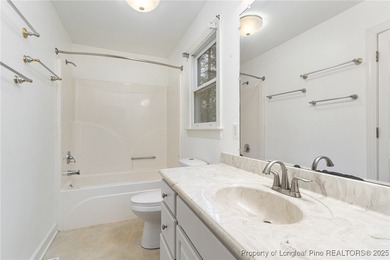 Welcome to this beautiful 3-bedroom, 2-bath home located in a on Carolina Trace Country Club in North Carolina - for sale on GolfHomes.com, golf home, golf lot