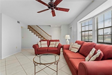 STUNNING WATERFRONT TOWNHOME IN PGI W/DEEDED DOCK - Discover the on Saint Andrews South Golf Club in Florida - for sale on GolfHomes.com, golf home, golf lot