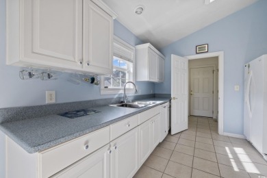 Welcome Home! Discover this beautiful three-bedroom on International Club of Myrtle Beach in South Carolina - for sale on GolfHomes.com, golf home, golf lot