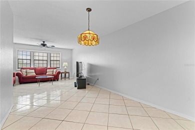 STUNNING WATERFRONT TOWNHOME IN PGI W/DEEDED DOCK - Discover the on Saint Andrews South Golf Club in Florida - for sale on GolfHomes.com, golf home, golf lot