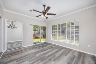 Welcome to this beautifully maintained 3-bedroom, 2-bath on Tiger Point Golf and Country Club in Florida - for sale on GolfHomes.com, golf home, golf lot